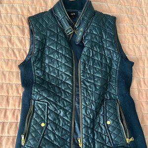 Navy blue faux leather vest, with gold zipper and buckle detail